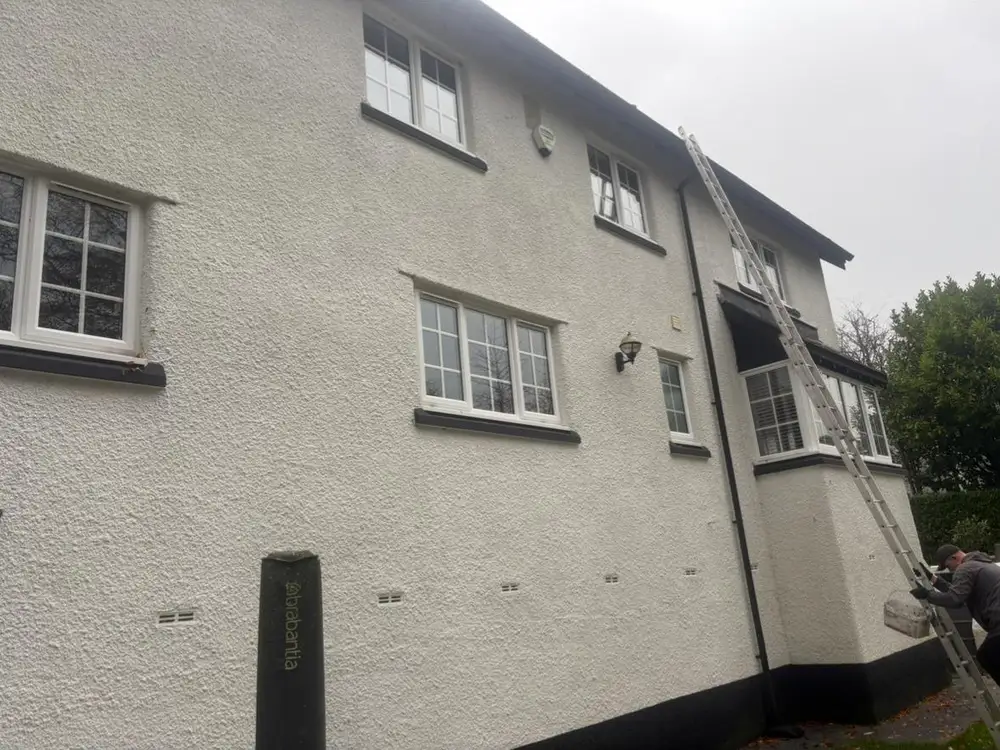 Rendered three-storey house exterior