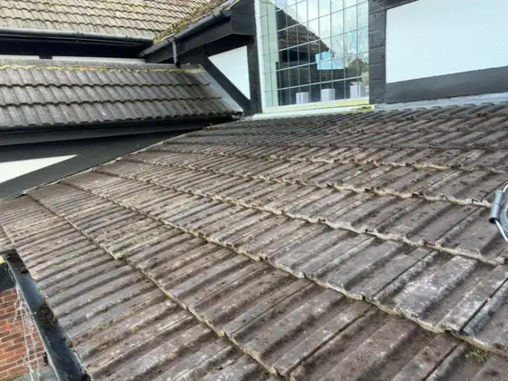 Concrete tiles after cleaning below a dormer
